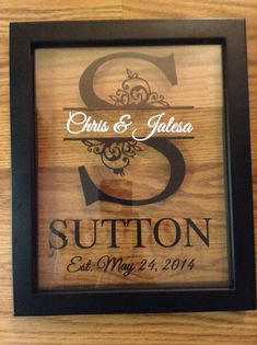 an image of a wooden frame with the words, wedding date and name on it