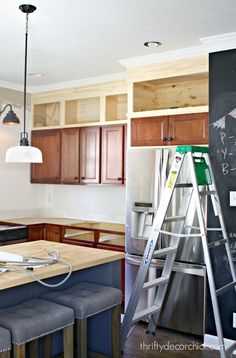 the kitchen is being remodeled with new cabinets