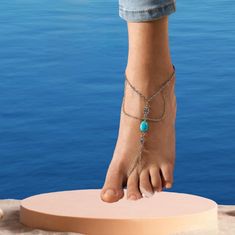 Boho Style Foot Chain Uniquely Designed Anklet With A Turquoise Stone. Blue Metal Jewelry For Beach, Silver Adjustable Anklets For Vacation, Adjustable Silver Anklets For Vacation, Silver Metal Jewelry For Vacation, Blue Bohemian Anklets For Party, Adjustable Silver Chain Jewelry For Beach, Turquoise Stone, Blue And Silver, Anklets