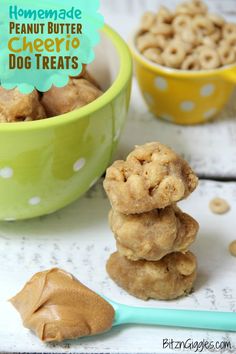 there are some peanut butter cookies stacked on top of each other in front of the bowl