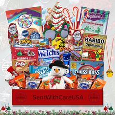 a christmas gift basket filled with candy, candies and other holiday treats for someone special