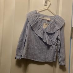 Front Tie Wrap Around Cute Light Blue Shirt For Spring, Cute Blue Shirt For Spring, Cute Blue Spring Shirt, Cute Long Sleeve Zara Blouse, Cute Zara Blouse For Spring, Cute Zara Long Sleeve Blouse, Cute Blue Blouse For Spring, Cute Light Blue Cotton Blouse, Cute Blue Spring Blouse