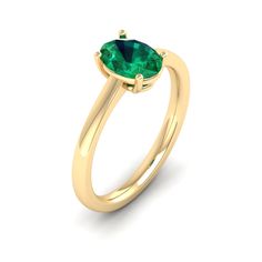 This elegant ring features a stunning oval emerald stone set in lustrous white gold. The vibrant green hue of the emerald is beautifully complemented by the brilliance of the white gold band, creating a timeless and sophisticated piece of jewelry. Metal: 14K Gold Setting Type: Prong Rhodium Finish: Yes, on White Gold Gemstone Details: Gemstone: Emerald Shape: Oval Average Dimensions: 8.00 x 6.00 MM Quantity: 01 Average Cut: Very Good Average Color: Medium to Dark Green Average Clarity: Eye Clean Fine Jewelry Emerald Green Oval Cabochon Ring, Green Oval Cabochon Emerald Ring, Oval Emerald Birthstone Ring In Fine Jewelry Style, Green Oval Cabochon Emerald Ring For Wedding, Green Emerald Oval Cabochon Ring For Wedding, Oval Tsavorite White Gold Ring, Elegant Oval Emerald Ring For May Birthstone, Oval Tsavorite Ring In White Gold, Classic Oval Cabochon Emerald Ring