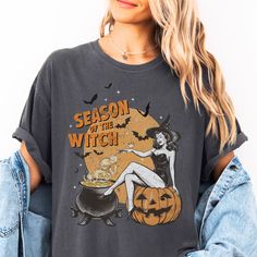 This Season of the Witch Halloween t-shirt makes a great gift for family, friends, coworkers and of course yourself! Comfort Colors introduces its garment-dyed t-shirt made 100% with ring-spun cotton. The soft-washed, garment-dyed fabric brings extra coziness to your wardrobe while the relaxed fit makes it an excellent daily choice. The double-needle stitching throughout the tee makes it highly durable while the lack of side-seams helps the shirt retain its tubular shape. .: 100% ring-spun cotton .: Medium fabric (6.1 oz/yd² (206.8 g/m .: Relaxed fit .: Sewn-in twill label WASHING INSTRUCTIONS ▸ Wash inside out, in cold water, on gentle cycle. Tumble dry low or let air dry ▸ Do not use Fabric Softeners or Bleach ▸ Do not dry clean. Avoid ironing on the design. SIZE ▸ Take a look at the pho Retro Halloween T-shirt With Screen Print, Vintage Cotton Halloween T-shirt, Halloween Relaxed Fit Graphic T-shirt, Halloween Soft-washed Relaxed Fit T-shirt, Retro Halloween Cotton T-shirt, Fall Party, Season Of The Witch, Halloween Tees, Retro Halloween