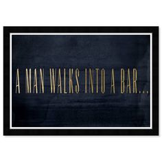 a man walks into a bar framed in black and gold with the words,'a man walks into a bar '