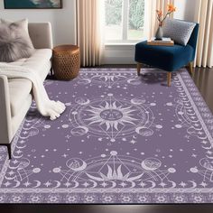 a living room with a purple rug on the floor