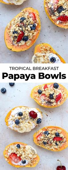 tropical breakfast papaya bowls with berries and granola toppings on top are shown here