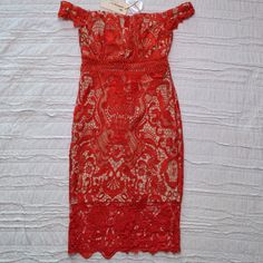 Nwt Bella & Bloom "The Clothing Company" Off The Shoulder Red Dress. Never Been Worn, With Red Lace Detail. Zips In The Back, Cutout Lace Detail At The Waistline. Perfect For A Summer Date Night! Size: Small 100% Polyester Pit To Pit: 14" Length: 34" Waist: 15.5" Feel Free To Ask Questions Or Make An Offer! All Reasonable Offers Accepted! Spring Red Lace Midi Dress, Red Lace Knee-length Mini Dress, Red Lace Mini Dress For Spring, Red Lace Midi Dress With Short Sleeves, Red Fitted Lace Midi Dress, Red Lace Fitted Midi Dress, Off The Shoulder Red Dress, Red V Neck Dress, Orange Lace Dress