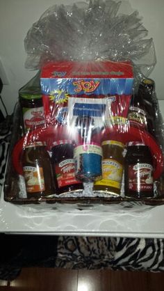 a basket filled with condiments on top of a table