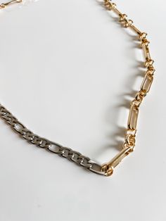 Effortlessly elevate your style with The Bennet mixed metal stunner chain. Combining gold and silver, this accessory makes it easy to mix and match your jewelry pieces. Perfect for the fashion-forward individual seeking a sleek and modern look. Mixed Metals, Elevate Your Style, Mix And Match, Gold And Silver, Jewelry Pieces, Your Style, Fashion Forward, Sleek, Chain