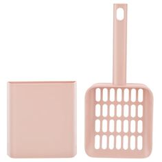 a pink bathroom set with a brush and soap dispenser