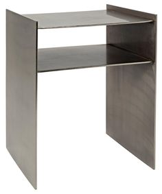 a metal desk with one shelf on the side