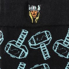 Wear your love for one of Marvel's beloved heroes with these black and electric blue dress socks. With a throwback to his classic design, Thor's head is stitched into the band of the sock while a series of his hammer, Mjolnir, creates the electric blue pattern from top to toe. Imbued with the power of superhero craftsmanship, our cotton blend socks are built to withstand the mightiest battles while making sure you'll always maintain your sharp, heroic look. A fun dress sock you can wear in a pro Electric Blue Dress, Electric Blue Dresses, Fun Dress, Black Socks, Dress Socks, Blue Pattern, Blue Dress, Thor, Electric Blue