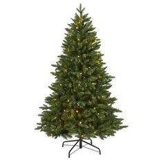 a small christmas tree with lights on it's base and stand in front of a white background