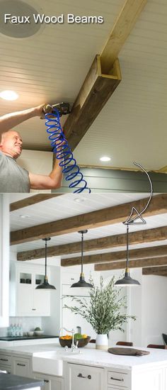 a man is working on the ceiling in his kitchen with blue hose attached to it