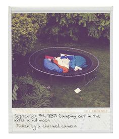 an empty trampoline with clothes on it in the grass