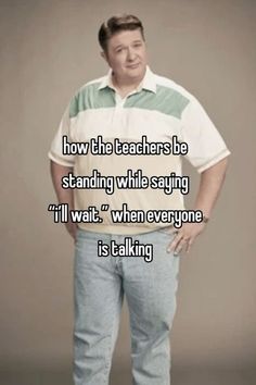 a man standing in front of a gray background with the caption how the teachers be standing while saying i'll wait when everyone is talking