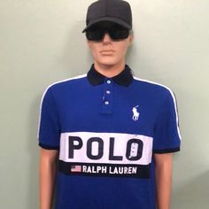 Nwt Polo Ralph Lauren Logo Classic-Fit Cotton Short-Sleeve Polo - Size M. Polo Features Short-Sleeves, Functional 1/4-Button Front Closure, Collar, Breathable Cotton Fabric Construction, Stitched Logo Emblem & Printed Brand Name Emblazoned On Front Of Shirt, And A Slight Hi-Lo Style (Slightly Longer In Back That In Front) W/ 1.5in Slits/Vents From Hemline On Either Side Measurements: Length: 28 Bust: 44 Waist: 44 Color/Pattern: Blue/Ivory/Red, Stripe/Logo Material: Cotton Collared Tops With Logo Print For Summer, Summer Collared Tops With Logo Print, Summer Collared Top With Logo Print, Blue Fitted Collared T-shirt, Fitted Blue Tops With Logo Print, Fitted Navy T-shirt For Spring, Navy Polo Collar Top For Spring, Red Polo Shirt, Paisley Shirt