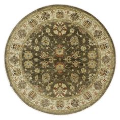 a brown and beige rug with an intricate design on the center, surrounded by smaller flowers