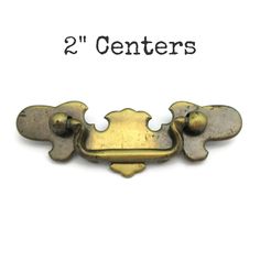 two centers brass plated door handle