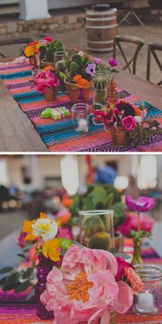 the table is decorated with colorful flowers and candles