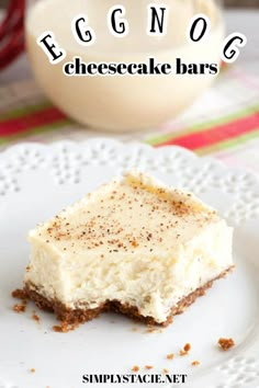 eggnog cheesecake bars on a white plate with the title text overlay