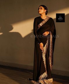 "Designer Black saree with Hand Embellished border all over the saree, Saree with the hand-embellished. Paired with a matching blouse. The Sari has a beautiful floral motif border with hand embellishments. Changes in the blouse can be done.. Saree is custom-made. Any kind of variation in the neckline and blouse can be done. Once you will order I will send you a measurement sheet which you need to fill out. Alternatively, you could just choose an age group in which case I would use the standard measurement for that age. Please allow 4-6 weeks for the order to get processed and shipped as the dress is made with love just for you! And we make sure to make you wear the BEST Customers need to know all of the dresses don't come \"on the shelf\" we strongly recommend you to select \"custom made\" Bollywood Style Evening Saree Set, Evening Festive Saree Set, Black Dola Silk Sets With Zari Work, Resham Embroidered Anarkali Set For Navratri Evening, Navratri Evening Anarkali Set With Resham Embroidery, Art Silk Choli With Zari Work For Evening, Evening Art Silk Choli With Zari Work, Chanderi Lehenga For Evening Festivals, Traditional Evening Lehenga In Chanderi