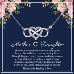 mother's day card with two intertwined hearts and flowers