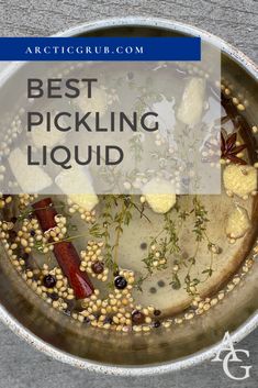 the best pickling liquid is in a pan with herbs and other things on it