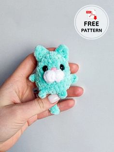 a hand holding a small stuffed animal in it's left hand with the caption free pattern