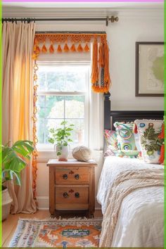 a bed room with a neatly made bed next to a window