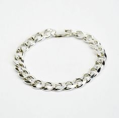 Everyday Silver Cuban Link Bracelet, Modern Sterling Silver Cuban Link Bracelet For Everyday, Everyday Sterling Silver Bracelet With Chunky Chain, Everyday Sterling Silver Bracelet With Curb Chain, Classic Sterling Silver Chunky Chain Bracelet, Modern Silver Cuban Link Bracelet With Chunky Chain, Silver Minimalist Cuban Link Bracelet, Silver Minimalist Curb Chain Bracelet, Silver Curb Chain Minimalist Bracelet