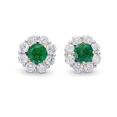 METAL SPECIFICATIONS Metal Name : White and Yellow Gold 14K STONE SPECIFICATIONS Stone Name : Green Emerald Diamond Stone Cut : Round Stone Details : There is one emerald approx. 1.50 carats each (Approx. Dia. 7 mm) and approx. 1.40 carats of smaller diamonds on the side in each earring. Natural earth-mined stones. Total Stone Weight : approx. 5.80 carats Color : Green/F Clarity : AAA/VVS1 APPRAISAL Appraised Value : $9500.00 Comes with cert Earrings White Gold, Diamond Earrings Studs Round, Halo Earrings, Three Stone Diamond, Halo Earrings Studs, White Gold Diamond Rings, Wedding Jewelry Earrings, Earrings White, Diamond Stud