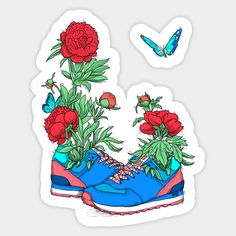 a pair of blue sneakers with red flowers on them and a butterfly flying over it