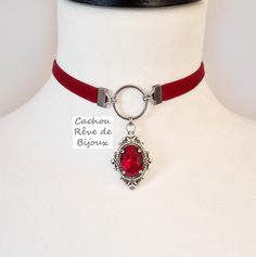 Victorian style velvet choker necklace with a beautiful intense red crystal. -------------- Details ---------------- - Real oval faceted cut crystal: 13x18mm - Vibrant color: dark red - Victorian pendant set with claws in antique silver-colored brass: 45x25mm - Choker in dark red velvet and stainless steel findings: 32-39cm with the extension to adjust to your convenience (contact me for another length) - Several colors available in my store -------------- Delivery -------------- The jewelry is Victorian Choker, Dark Red Velvet, Victorian Accessories, Velvet Choker Necklaces, Victorian Pendants, Vintage Choker, Velvet Choker, Gift Love, Victorian Gothic