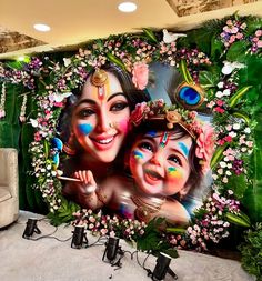 an image of two women with colorful makeup on their faces and surrounded by greenery