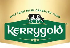 a sign for kerry gold milk with a cow grazing on it