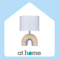 the home logo has a rainbow lamp on it's base with a white shade