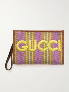 Gucci's pouch has a handy wristlet strap for easy carrying. It's been made in Italy from colorful, striped raffia embroidered with the logo in bold yellow letters across the front and is reinforced with smooth leather trims. The canvas-lined interior will comfortably stow your phone, cardholder and keys. Gucci Rectangular Bag With Embroidered Logo, Gucci Designer Bag With Embroidered Logo, Designer Gucci Bag With Embroidered Logo, Leather Letters, Gucci Pouch, Yellow Letters, Gucci Leather, Gucci Accessories, Gucci Handbags