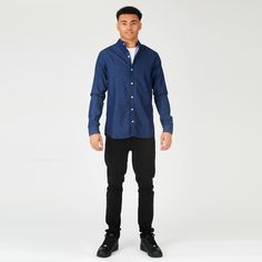 "Introducing our Slim Fit Grandad Collar Denim Shirt in Indigo Blue, the perfect blend of classic style and contemporary finesse. Crafted with utmost care, this denim shirt exudes a timeless charm with its slim fit silhouette that enhances your physique. The grandad collar adds a touch of refinement, while the indigo blue hue brings a sophisticated elegance to your look. Made from high-quality denim fabric, this shirt delivers both comfort and durability. Whether you're heading to a casual gathering or a formal event, our Slim Fit Grandad Collar Denim Shirt in Indigo Blue is the ultimate wardrobe staple for those who appreciate exceptional style and impeccable craftsmanship. Product Features: Indigo blue Denim fabric Slim fit Button front fastening Long sleeve Grandad collar 100% Cotton Ou Denim Blue Cotton Shirt With Spread Collar, Classic Indigo Shirt For Work, Denim Blue Slim Fit Long Sleeve Shirt, Casual Blue Slim Fit Dress Shirt, Modern Blue Tops With Button Closure, Denim Blue Slim Fit Casual Shirt, Slim Fit Denim Blue Casual Shirt, Blue Denim Slim Fit Shirt, Casual Slim Fit Denim Blue Shirt