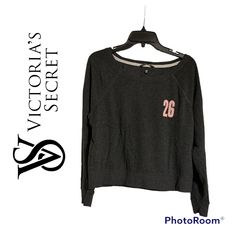 This Is A New Without Tags Never Worn Victoria's Secret Angel's Crop Sweatshirt In A Size Small. Vs Angel's Is Written On The Left Arm And There Is A 26 On The Front. It Is A Faded Charcoal/Black Color. Flat Measurements: 23" From Armpit To Armpit, 12.5" From Armpit To Bottom, 20.5" From Shoulder To Bottom And 19" Across The Bottom. Flat Measurements Are Also In The Pictures. Victoria's Secret Sporty Tops For Fall, Victoria's Secret Casual Tops With Graphic Print, Casual Victoria's Secret Tops With Graphic Print, Victoria's Secret Long Sleeve Cotton Tops, Victoria's Secret Long Sleeve Loungewear Tops, Victoria's Secret Crew Neck Top With Letter Print, Victoria's Secret Graphic Print Crew Neck Top, Vs Angels, Victoria Secret Angels