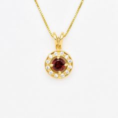 Gold Garnet Pendant set with Natural Garnet in a flawless clarity, diamond cut & stunning red color, at 5mm diameter (0.5 Ct) from Mozambique. Gold Vermeil: 18k Gold over Solid 925 Sterling Silver ☞ made to last. Matching Ring & Earrings - please ask me December Birthstone - Genuine & Natural Stone ❀ ❀ Each Natural Gem is unique & will have Slight variations from the product pictures "no two Natural Stones are alike" Details : ♥ Each item comes in a cute GIFT BOX ✓ ♥ GUARANTEE on all materials ✓ January Birthstone Necklace, Garnet Red, Garnet Pendant, Round Necklace, Red Necklace, January Birthstone, Matching Rings, Cz Diamond, Birthstone Necklace