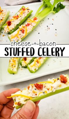 a person holding up a piece of stuffed celery with cheese and bacon on it