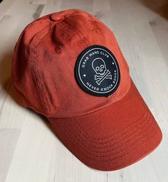 These caps are comfortable and a staple when heading to the stable! With a crisp, woven patch featuring our Grab Mane logo and pride, these hats are our go to when “enhancing” our barn hair or out with friends. 100% washed chino twill Unstructured, six-panel, low-profile Pre-curved visor Self-fabric tri-glide buckle closure - antique brass Size: 6 5/8" - 7 3/8" Casual Dad Hat With Logo Patch And Flat Bill, Trendy Cotton Baseball Cap With Logo Patch, Cotton Dad Hat With Logo Patch, Cotton Dad Hat With Logo Patch, One Size, Low Profile, Antique Brass, Baseball Cap, Buckle, Size 6