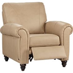 a beige recliner chair with a foot stool