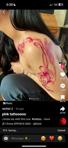 the back of a woman's shoulder with pink tattoos on her left arm and chest