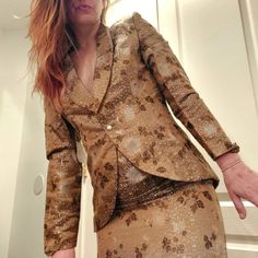 Phenomenal Designer Skirt And Jacket Set From The Late 1990's - Early 2000's. Exquisitely Embroidery Work In Metallic Shades Of Silk & Satin. Eastern Vibes. Single Breasted Pearl Enclosure On Jacket. Midi Skirt Zips In Back And Buttons At Waist. Fully Lined Interior. Absolutely Stunning And A Very Unique Find. Originally Priced At $770. Listed Size Is 6. Fits Xs/S But See Measurements To Confirm. Bust - 44 Sleeves - 21 Waist - 32 Length - 28 Waist - 25.5 Hips - 38 Length - 25 Chic Fitted Metallic Blazer, Metallic Fitted Blazer For Spring, Spring Metallic Fitted Blazer, Fitted Metallic Blazer For Formal Occasions, Brocade Long Sleeve Party Blazer, Glamorous Fitted Blazer For Festive Occasions, Brocade Long Sleeve Blazer For Party, Glamorous Fitted Festive Blazer, Brocade Blazer With Long Sleeves For Parties