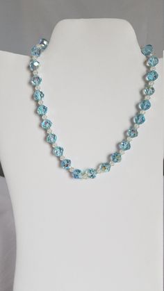 "This 1940's-50's BLUE IRIDESCENT CRYSTAL NECKLACE is 14\"-16\" long. The delicate BLUE shade of the crystal beads is rare and would be perfect to wear in a wedding. ( see photos for sizes & details ) This necklace is in VERY GOOD-EXCELLENT VINTAGE CONDITION. Questions ? Please call 1-207-865-6191." Vintage Blue Crystal Necklaces, Blue Vintage Crystal Necklaces, Blue Crystal Necklaces With Faceted Beads, Blue Crystal Necklace With Faceted Beads, Blue Single Strand Wedding Necklace, Blue Crystal Necklaces For Wedding, Blue Crystal Necklace For Wedding, Blue Single Strand Beaded Necklace For Wedding, Vintage Bridal Necklace