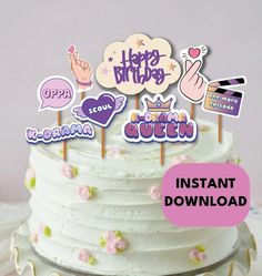 a white cake topped with lots of stickers