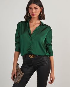 This top! We love the Kayla Satin Button Down Top for keeping your look dressy yet accessible no matter how you style it. It features a collared neckline and long sleeves with button cuffs. It's not too fitted or too relaxed — we recommend leaving a few buttons open and styling it with faux leather bottoms for work or play. Full-length fit Collared neckline Front button closures Smooth, satin fabric 100% Polyester Runs Small Oversized Satin Shirt, Shirts Oversized, Western Wear Dresses, Satin Shirt, Dresses By Length, Black Friday Shopping, Wrap Sweater, Fall Shopping, New Tops